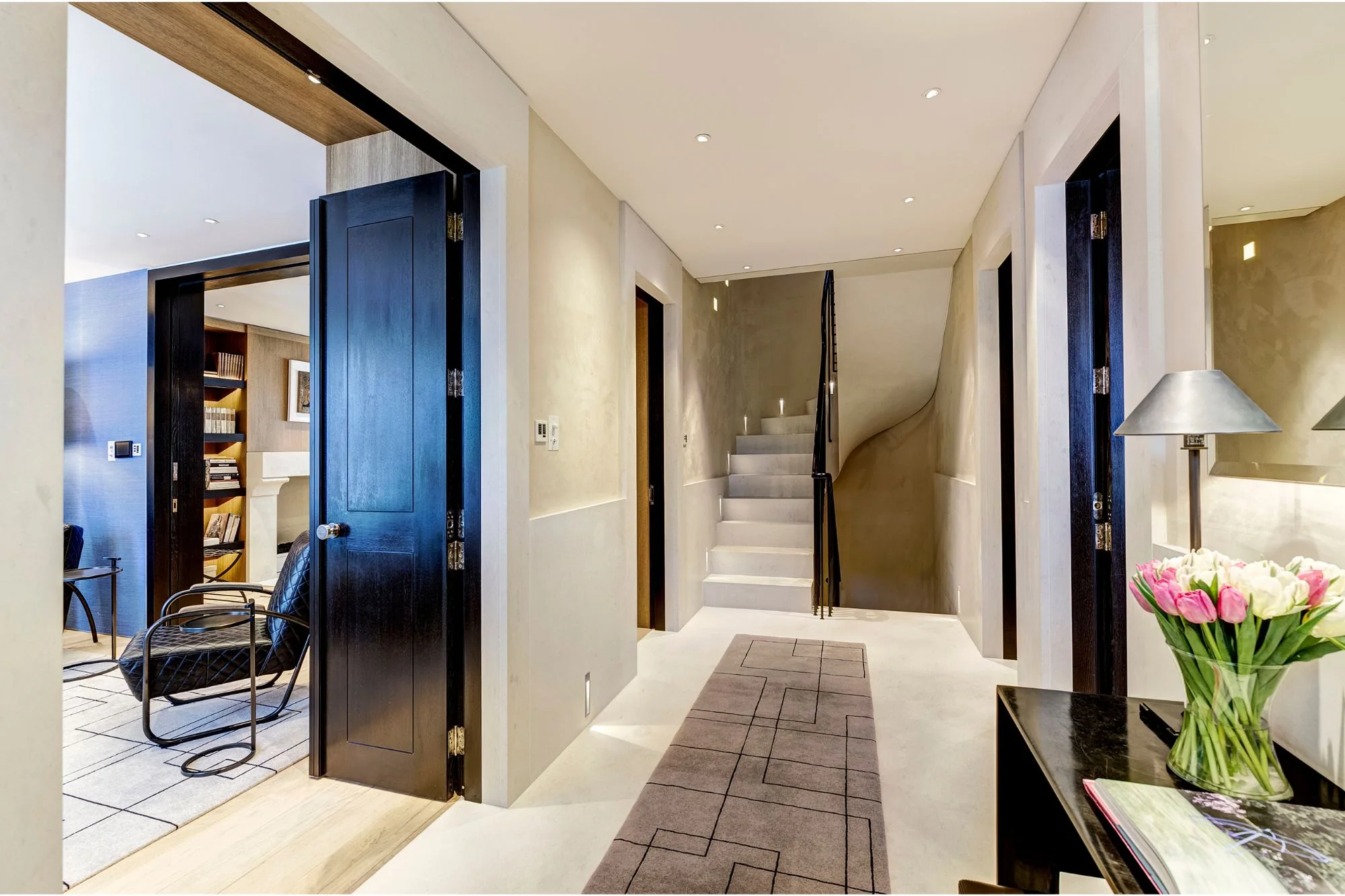 Suede wallcovering in the hallway of a Knightsbridge residence